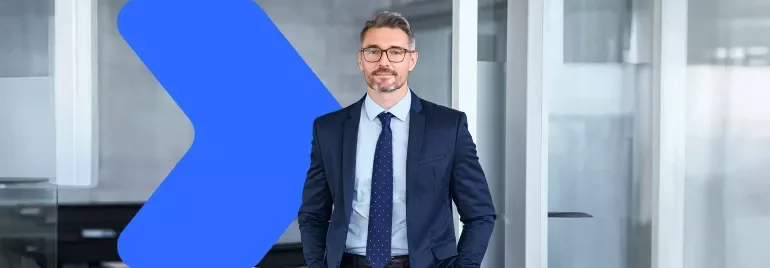 Man in a suit with his hands in his pockets