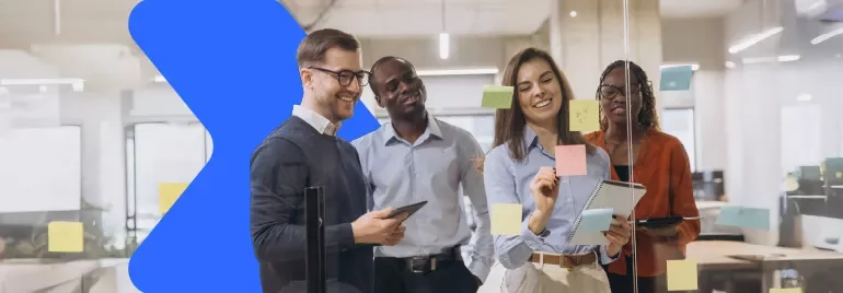 a group writing on post-its in the office