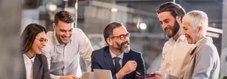 a group having a conversation in a luminous room 